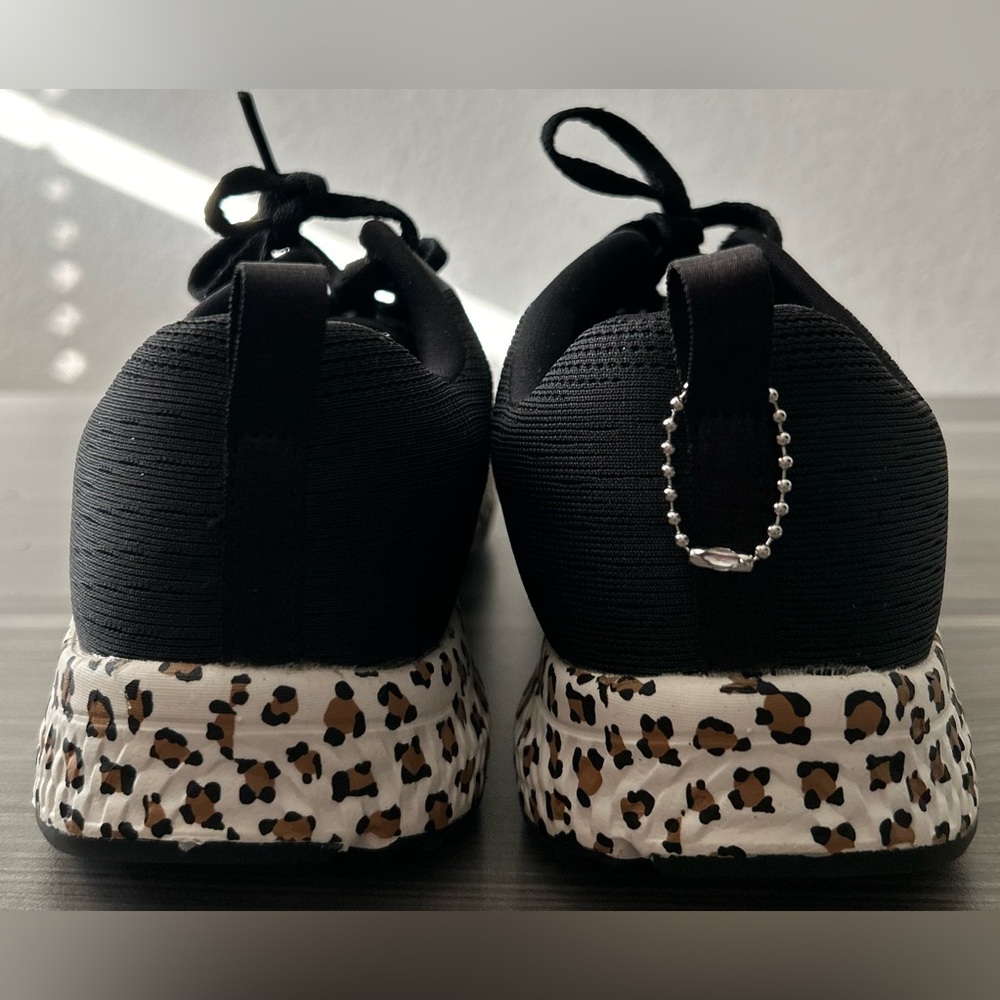 Skechers Black Athletic Sneakers with Leopard-Print Midsole - Picture 4 of 10